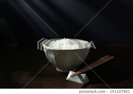 White rice served in a bowl. White rice served in a bowl. 141107981