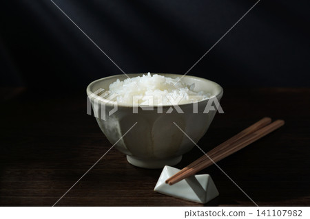 White rice served in a bowl. White rice served in a bowl. 141107982