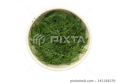 bunch of dill on the dark Stock Photo 141108270
