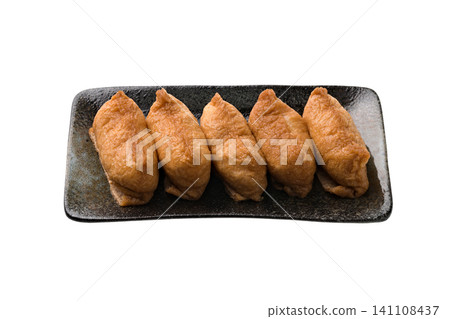 Inari sushi placed on a plate Inari sushi placed on a plate 141108437
