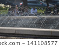 City Fountain Water Splash - Urban Summer and Architecture Concept. 141108577