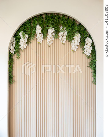 Elegant Floral Arch Background with White Orchids and Green Foliage. Elegant Floral Arch Background with White Orchids and Green Foliage. 141108808