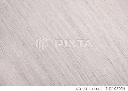 A beige background with a pattern of lines. The canvas background. Beige fabric texture. Light cream contrast texture. Natural fabric texture for backgrounds A beige background with a pattern of lines. The canvas background. Beige fabric texture. Light cream contrast texture. Natural fabric texture for backgrounds 141108954