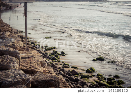 Waves crashing against the rocky coastline with a view of the Mediterranean Sea in Tel Aviv Waves crashing against the rocky coastline with a view of the Mediterranean Sea in Tel Aviv 141109120