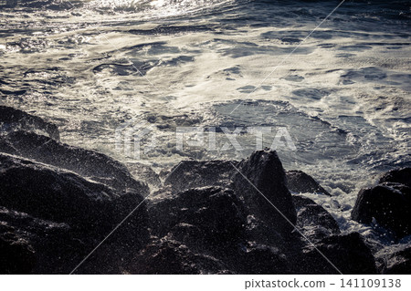 Waves crashing against the rocky coastline with a view of the Mediterranean Sea in Tel Aviv Waves crashing against the rocky coastline with a view of the Mediterranean Sea in Tel Aviv 141109138