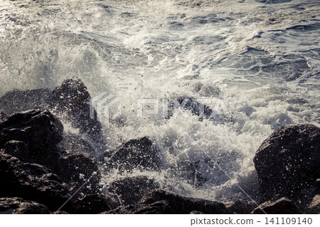 Waves crashing against the rocky coastline with a view of the Mediterranean Sea in Tel Aviv Waves crashing against the rocky coastline with a view of the Mediterranean Sea in Tel Aviv 141109140