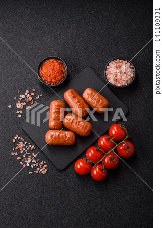 Chicken or pork grilling sausages with garlic, salt, and spices. Grilling sausages Chicken or pork grilling sausages with garlic, salt, and spices. Grilling sausages 141109331