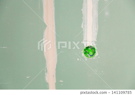 Drywall construction with embedded electrical wiring and copy space Drywall construction with embedded electrical wiring and copy space 141109785