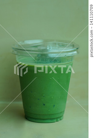 front view matcha green tea in a clear glass on cement wall background, drink, health, fresh, cool, copy space front view matcha green tea in a clear glass on cement wall background, drink, health, fresh, cool, copy space 141110709