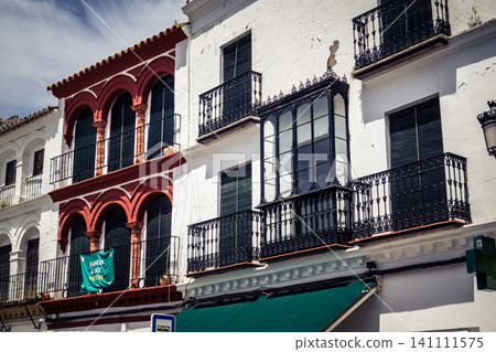 Traditional white-washed narrow streets and historical Andalusian architecture in Carmona 141111575