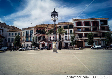 Traditional white-washed narrow streets and historical Andalusian architecture in Carmona 141111580
