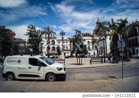 Traditional white-washed narrow streets and historical Andalusian architecture in Carmona Traditional white-washed narrow streets and historical Andalusian architecture in Carmona 141111611