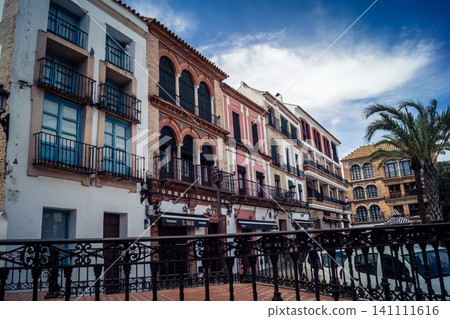 Traditional white-washed narrow streets and historical Andalusian architecture in Carmona 141111616