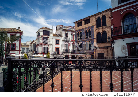 Traditional white-washed narrow streets and historical Andalusian architecture in Carmona Traditional white-washed narrow streets and historical Andalusian architecture in Carmona 141111677