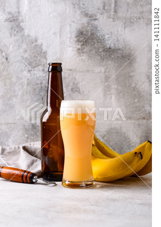 Craft banana beer or cider, non alcoholic drink Craft banana beer or cider, non alcoholic drink 141111842