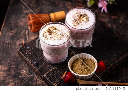 Strawberry matcha latte smoothie cocktail Strawberry matcha latte smoothie cocktail 141111945
