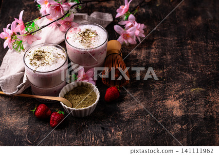Strawberry matcha latte smoothie cocktail Strawberry matcha latte smoothie cocktail 141111962