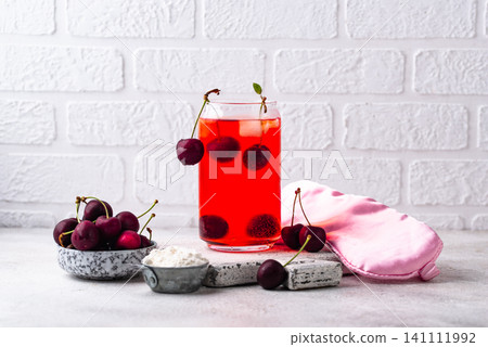 Sleepy girl cherry mocktail with magnesium Sleepy girl cherry mocktail with magnesium 141111992