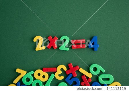 Children learning multiplication with colorful numbers back to school Children learning multiplication with colorful numbers back to school 141112119