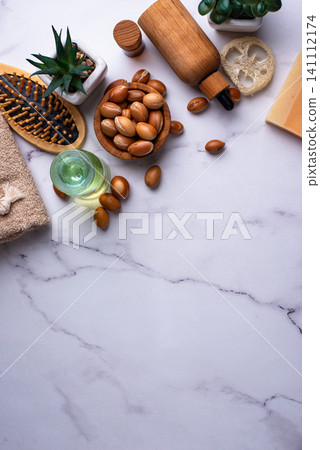 Moroccan argan seeds and oil for hair care Moroccan argan seeds and oil for hair care 141112174