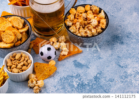 Beer and different snacks for Superbowl or football party Beer and different snacks for Superbowl or football party 141112175