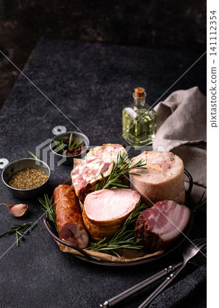Different meat, sausages, ham and smoked pork Different meat, sausages, ham and smoked pork 141112354