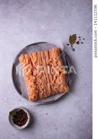 Raw fresh uncooked minced meat Raw fresh uncooked minced meat 141112596