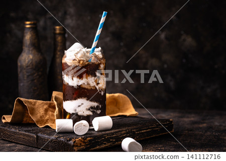 Fluffy coke from cola and marshmellow Fluffy coke from cola and marshmellow 141112716