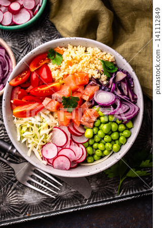 Balanced healthy bowl with vegetables and salmon Balanced healthy bowl with vegetables and salmon 141112849