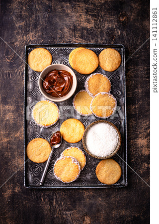 Alfajores, traditional Spanish sandwich cookies Alfajores, traditional Spanish sandwich cookies 141112861