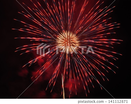 A large firework display with red rays radiating outwards: Omagari Fireworks Festival, Akita Prefecture A large firework display with red rays radiating outwards: Omagari Fireworks Festival, Akita Prefecture 141112871
