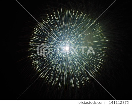 A close-up of a large, bluish-white fireworks display at the Omagari Fireworks Festival in Akita Prefecture. A close-up of a large, bluish-white fireworks display at the Omagari Fireworks Festival in Akita Prefecture. 141112875