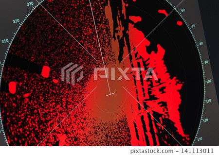 Red light patterns on a digital radar screen display on a dark background 141113011