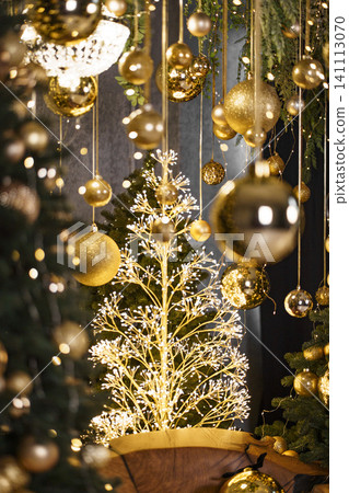 Luxurious Holiday Scene with Golden Baubles and Warm Festive Lighting Luxurious Holiday Scene with Golden Baubles and Warm Festive Lighting 141113070