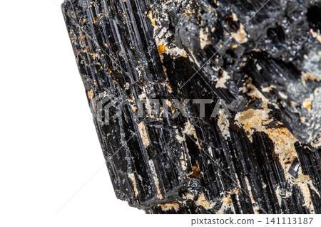 macro mineral stone sherle, schorl, black tourmaline on white background macro mineral stone sherle, schorl, black tourmaline on white background 141113187