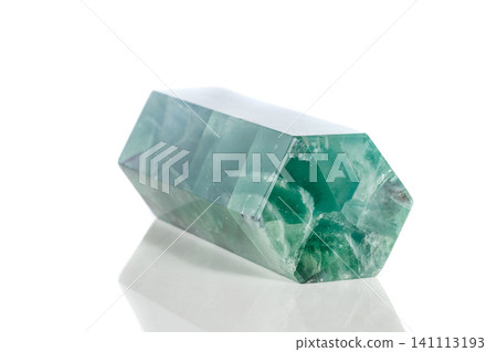 Macro mineral stone Fluorite crystal on a black background Macro mineral stone Fluorite crystal on a black background 141113193