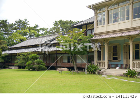 Lush gardens and buildings blending Japanese and Western architectural styles Lush gardens and buildings blending Japanese and Western architectural styles 141113429