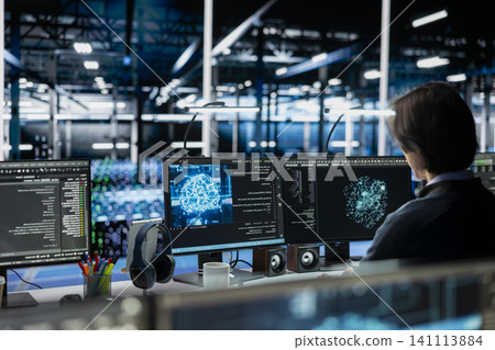 Server room admin running simulations for AI driven prediction, tracking performance. Server room admin running simulations for AI driven prediction, tracking performance. 141113884