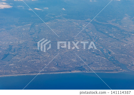 An aerial view of the Enshu Sea and Tenryu River from above Hamamatsu City, Shizuoka Prefecture, taken from an airplane. An aerial view of the Enshu Sea and Tenryu River from above Hamamatsu City, Shizuoka Prefecture, taken from an airplane. 141114387