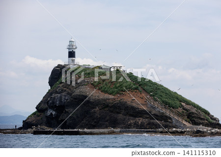 Taijima Island in Mutsu City, Aomori Prefecture, is accessible by ferry and is an impressive island with a whale-like shape. Taijima Island in Mutsu City, Aomori Prefecture, is accessible by ferry and is an impressive island with a whale-like shape. 141115310