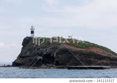 Wakinosawa Offshore - Taijima Island and Lighthouse: A stunning uninhabited island floating in the sea off Mutsu City, Aomori Prefecture. Wakinosawa Offshore - Taijima Island and Lighthouse: A stunning uninhabited island floating in the sea off Mutsu City, Aomori Prefecture. 141115317