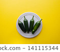 Jalapeño on a yellow background 141115344