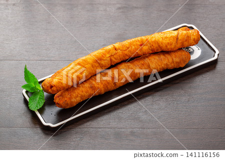 traditional Chinese Gluten Roll Ingredient on Wooden Table traditional Chinese Gluten Roll Ingredient on Wooden Table 141116156
