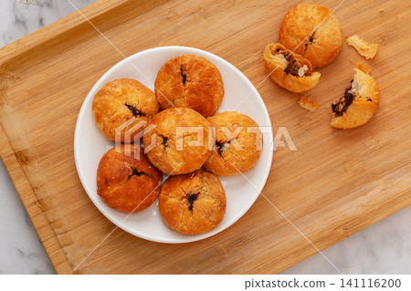 traditional Chinese Huangshan Shaobing, Crispy Mini Baked Biscuits with Savory Pork and Preserved Vegetable Filling traditional Chinese Huangshan Shaobing, Crispy Mini Baked Biscuits with Savory Pork and Preserved Vegetable Filling 141116200