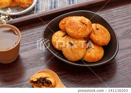 traditional Chinese Huangshan Shaobing, Crispy Mini Baked Biscuits with Savory Pork and Preserved Vegetable Filling traditional Chinese Huangshan Shaobing, Crispy Mini Baked Biscuits with Savory Pork and Preserved Vegetable Filling 141116203