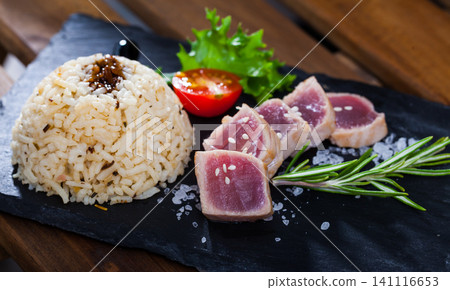 Tuna Tataki garnished with rice Tuna Tataki garnished with rice 141116653