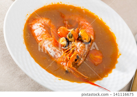 Spicy seafood soup with king prawns Spicy seafood soup with king prawns 141116675