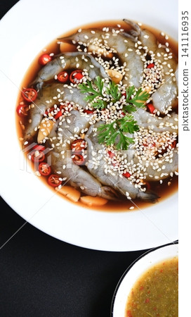shrimp in soy sauce on white plate, korean style menu shrimp in soy sauce on white plate, korean style menu 141116935