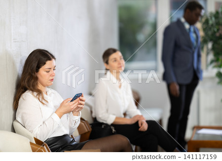 Specialists of different ages are waiting for an interview Specialists of different ages are waiting for an interview 141117159