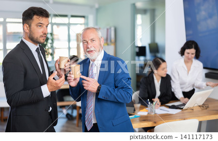 managers of the bank office discuss work issues during a coffee break managers of the bank office discuss work issues during a coffee break 141117173